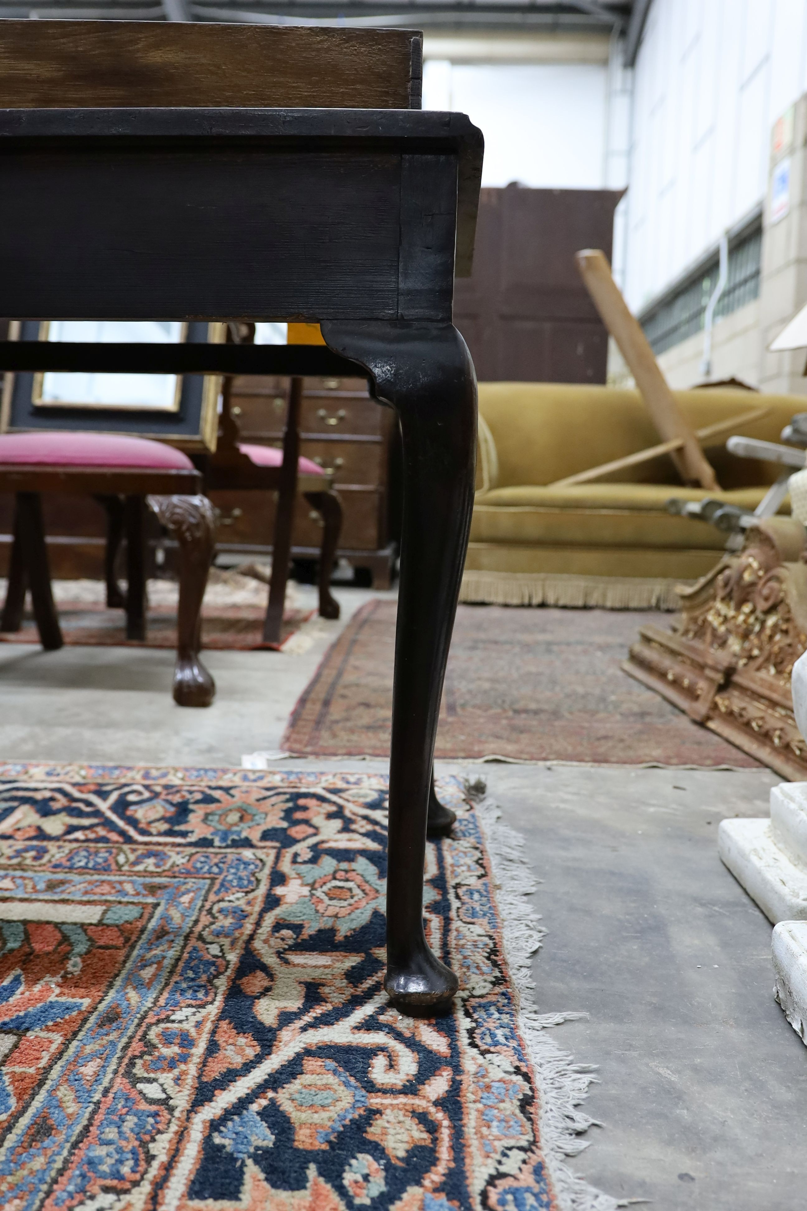 A George III mahogany side table, fitted with a single drawer, on cabriole legs, width 83cm, depth 48cm, height 67cm